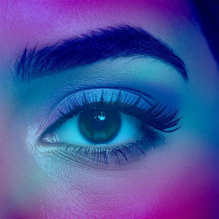 Close-up of a person's eye with colorful makeup