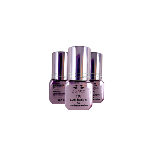 Three bottles of Lash Better UV Lash Adhesive on a white background